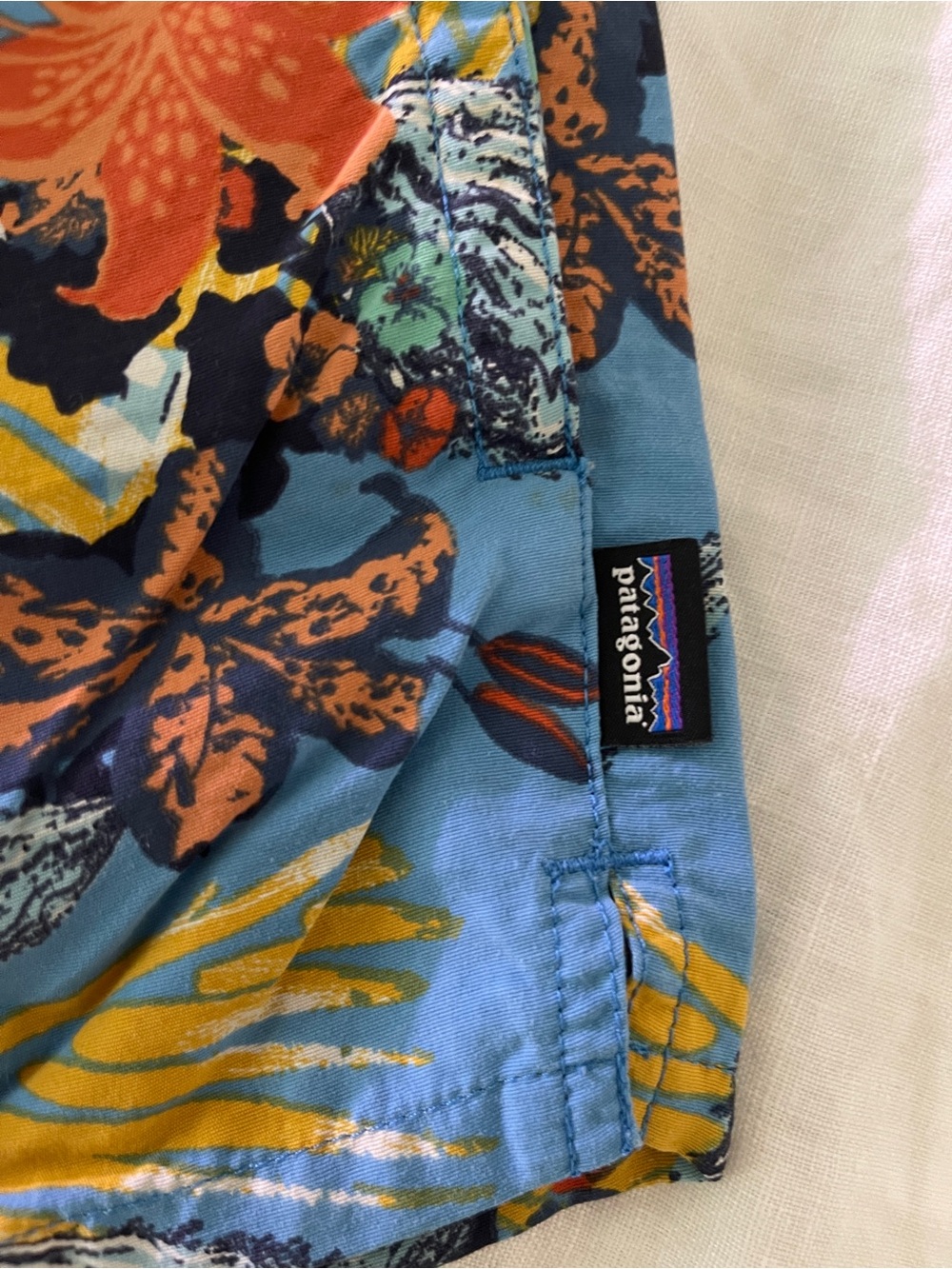 Patagonia Baggies Blue Floral Shorts with Orange Accent - Picture 3 of 4